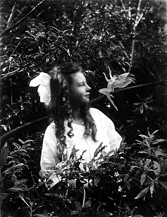 Frances Griffiths with the dancing Cottingley fairies in 1917